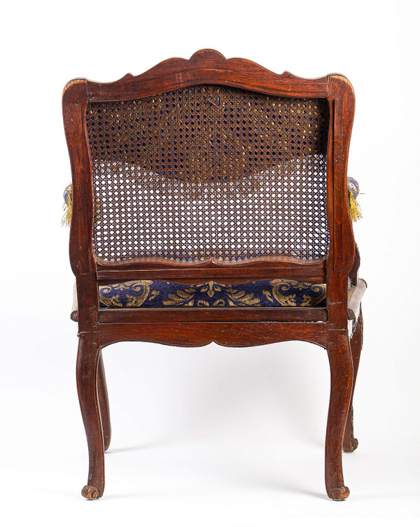 French Régence Period Hand-Carved Wood and Caned Armchair Circa 1720