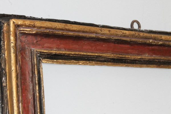 Antique 17th-era painted frame in carved and lacquered wood. Exterior 91.50 x 79 . Interior 75.7 x 6