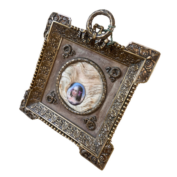 Bronze and brass frame with porcelain medallion