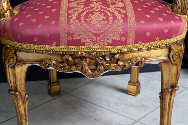 Pair of Napoleon III armchairs in gilded and carved wood. France 19th century.