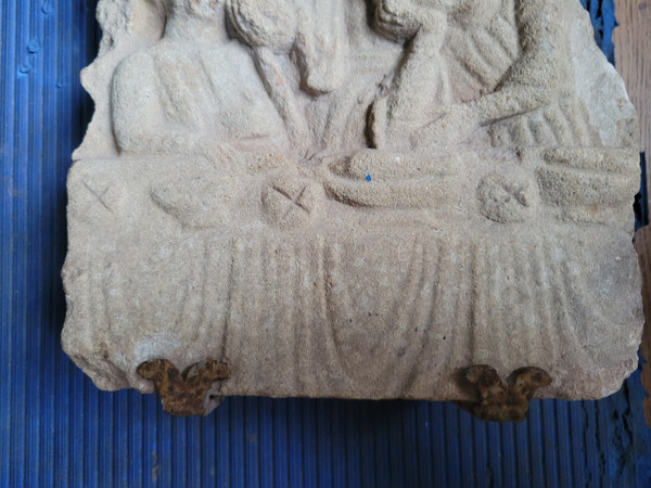 Fragment of high stone relief depicting Christ during the scene.