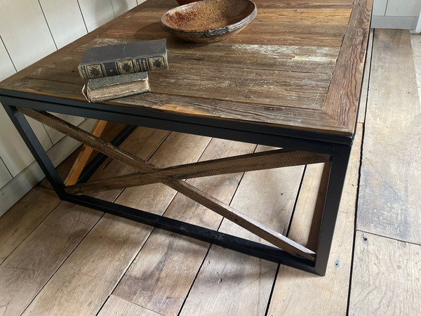 Coffee table with old castle floor on metal frame