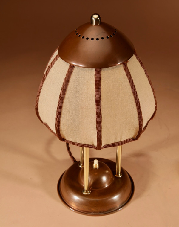  Rare brass and patinated copper table lamp by the Amsterdam School, circa 1900-20