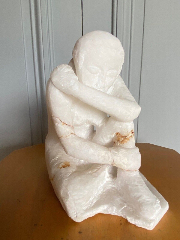 Direct-cut sculpture in onyx stone kneeling woman 20th century