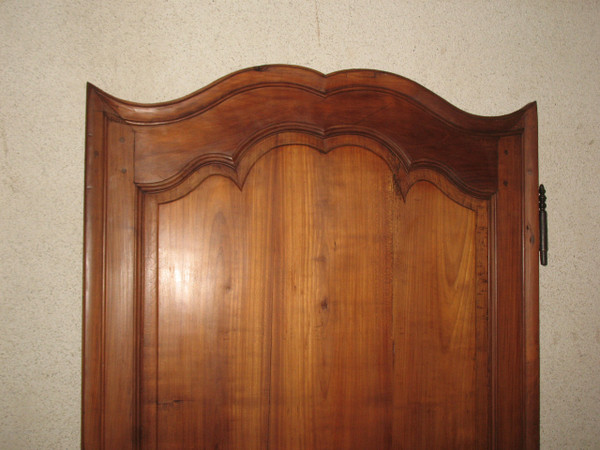 Louis XIV style molded woodwork door in cherry wood, late 18th century