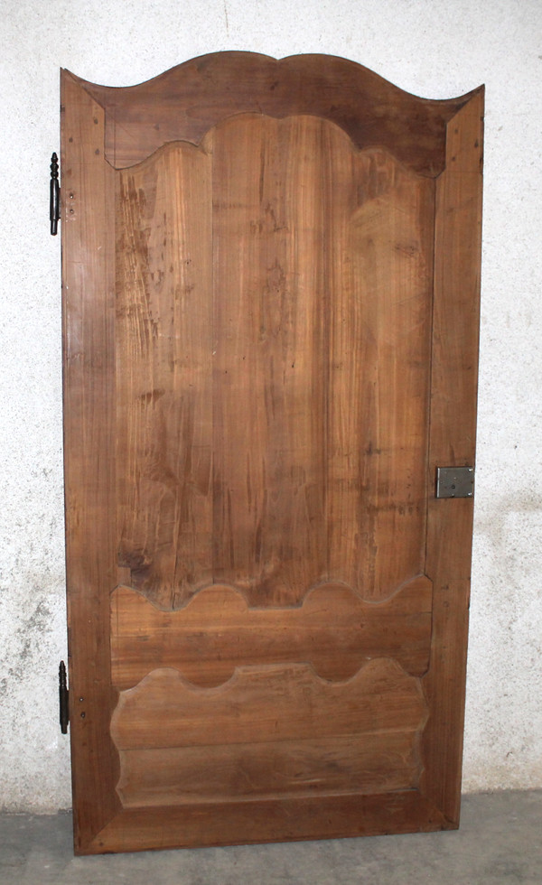 Louis XIV style molded woodwork door in cherry wood, late 18th century