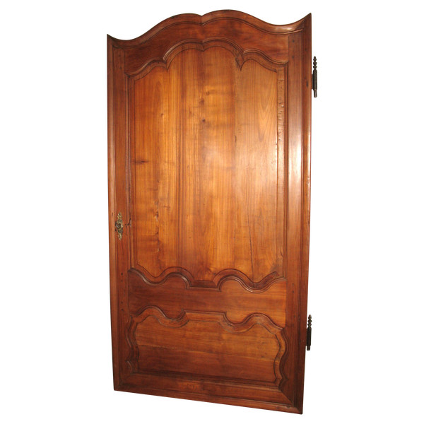 Louis XIV style molded woodwork door in cherry wood, late 18th century