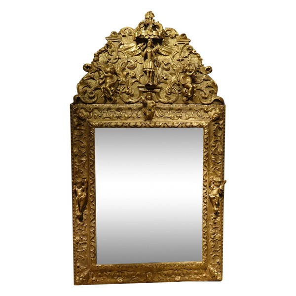 Large gilded wooden pediment mirror, Provence or Italy, 18th century.