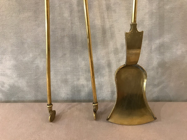 Set of a shovel and a fireplace tong in bronze and brass from the 19th century