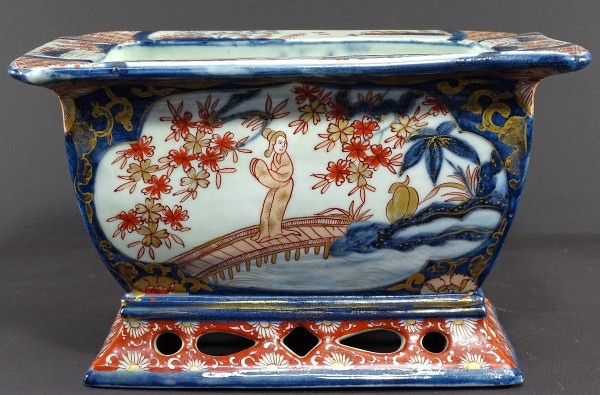 Japan, Late 19th Century, Imari Port, Porcelain Jardiniere Decorated With Animated Landscapes.