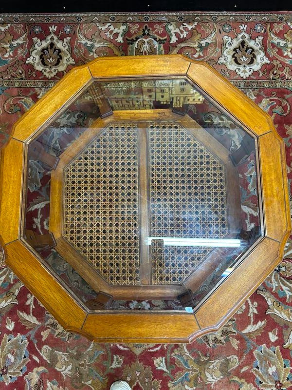 Rounded coffee table with glass top