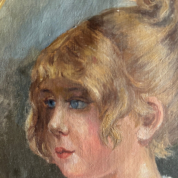 Oil on cardboard portrait of a young girl with blond hair, early 20th century