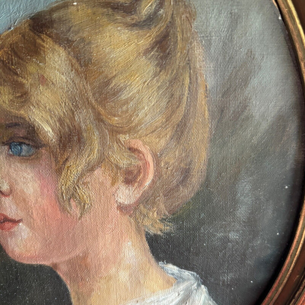 Oil on cardboard portrait of a young girl with blond hair, early 20th century