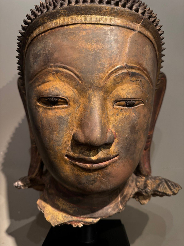 Large gilded terracotta Buddha head, Burma, Shan states, late 18th century.