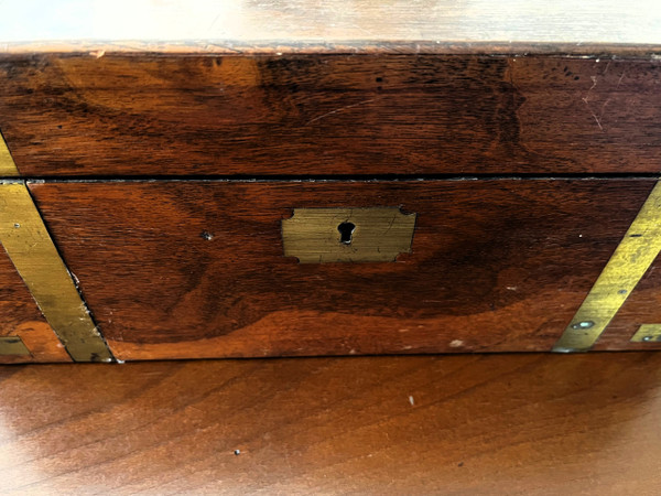 Marine writing desk, in solid mahogany with brass reinforcements, and two secret drawers.