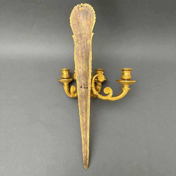 Pair of 3-light gilt bronze palmette wall lights, 19th century Restoration