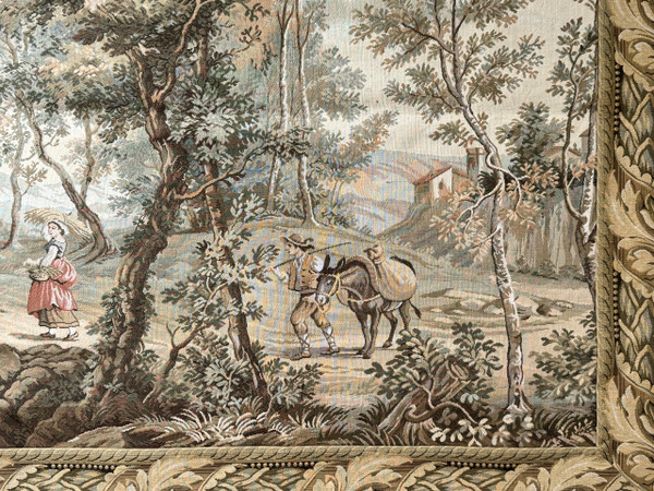 Mechanical tapestry depicting an animated landscape around a village