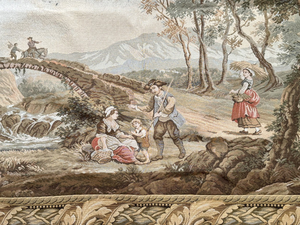 Mechanical tapestry depicting an animated landscape around a village