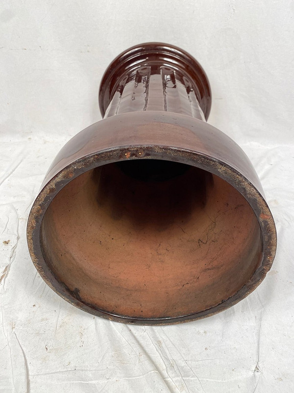 Complete in brown-toned enamelled ceramic, planter on its column