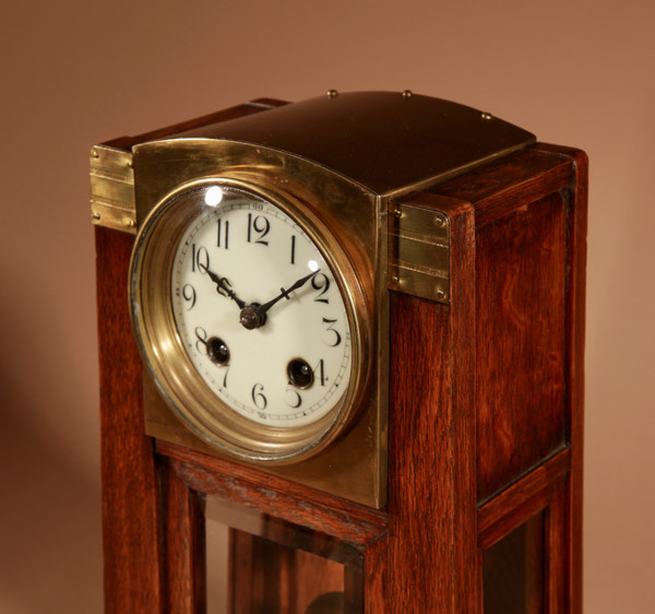 Art Nouveau/Deco Gustav Serrurier-Bovy (1858-1910) A rare oak and brass clock trim,