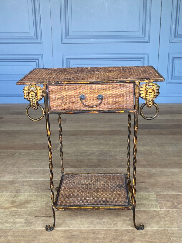 Small piece of furniture in rattan and gilded metal decorated with elephants 1970 one drawer