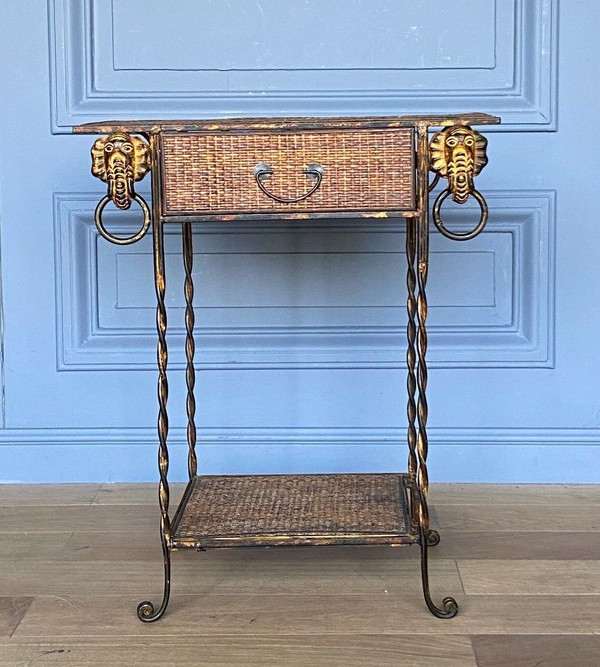 Small piece of furniture in rattan and gilded metal decorated with elephants 1970 one drawer