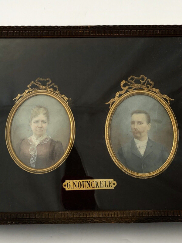 Pair of late 19th century couple miniatures by Georgine Nounckele bronze frame