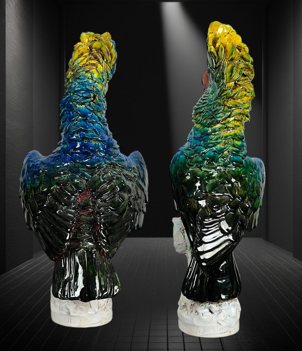 PAIR OF POLYCHROME GLAZED CERAMIC COCKATOOS BEARING A SIGNATURE