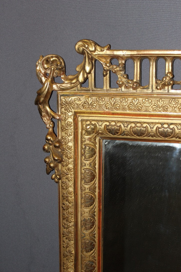 Napoleon III period mirror in 19th century gilded stucco