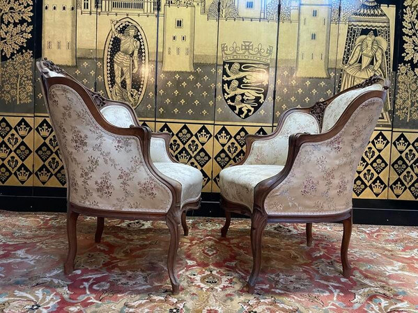 Pair of Louis XV rocaille bergere armchairs