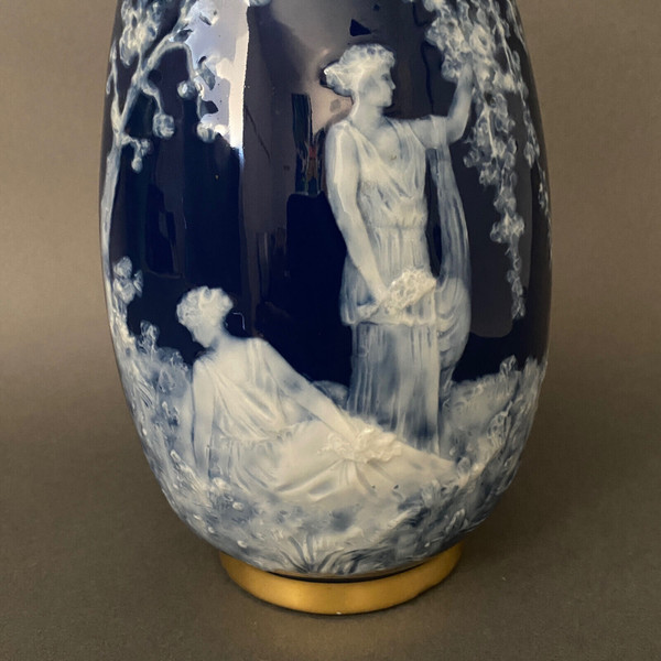 Marcel Chaufriasse Limoges porcelain vase with blue background