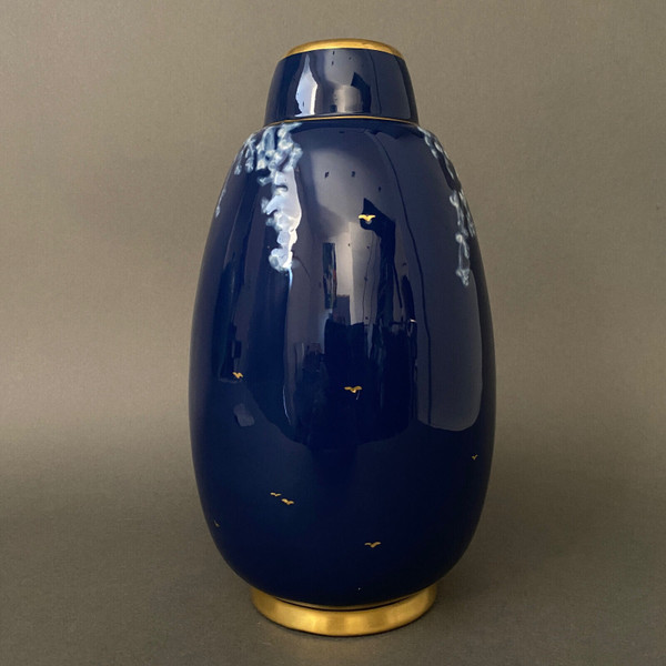 Marcel Chaufriasse Limoges porcelain vase with blue background