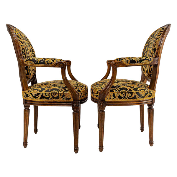 Pair of Louis XVI-style armchairs with medallion backs in carved and waxed molded natural wood