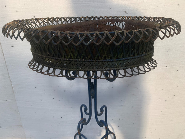 Oval planter on woven metal stand, 20th century