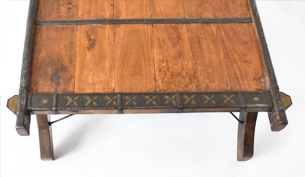 Wood and metal elephant saddle coffee table