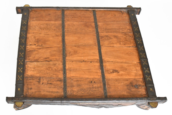 Wood and metal elephant saddle coffee table