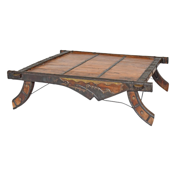 Wood and metal elephant saddle coffee table