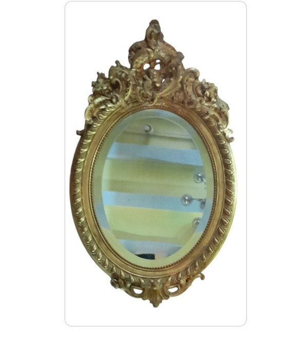 Oval gilded wood mirror