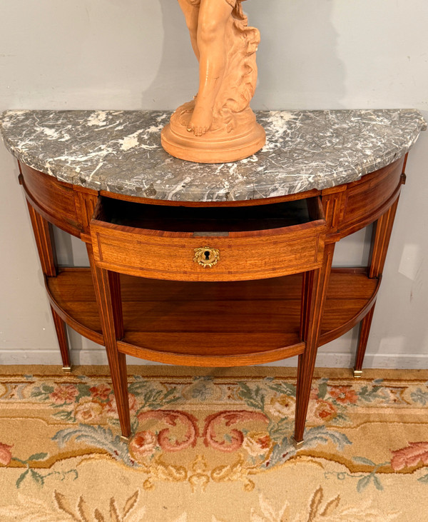 Louis XVI period half-moon console About 1780