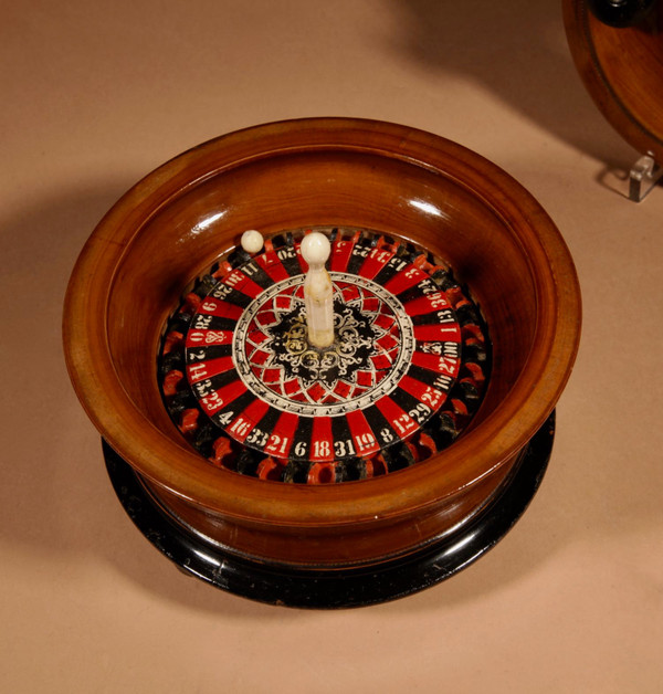  Interesting travel roulette wheel in turned wood.