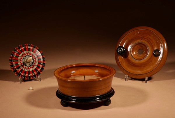  Interesting travel roulette wheel in turned wood.