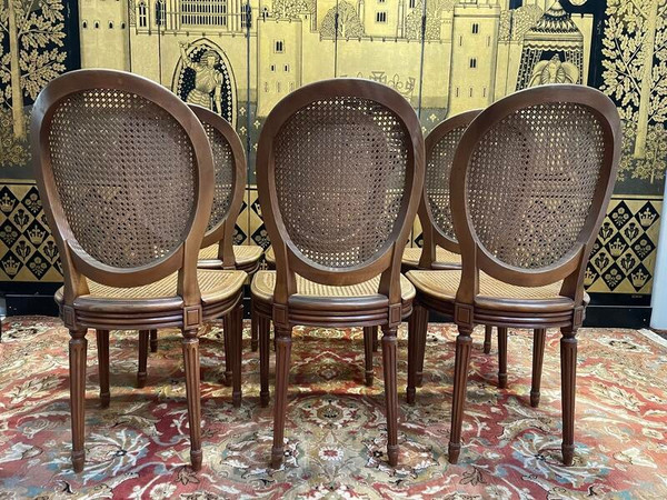 Suite de 6 chaises médaillon de style Louis XVI en cannage