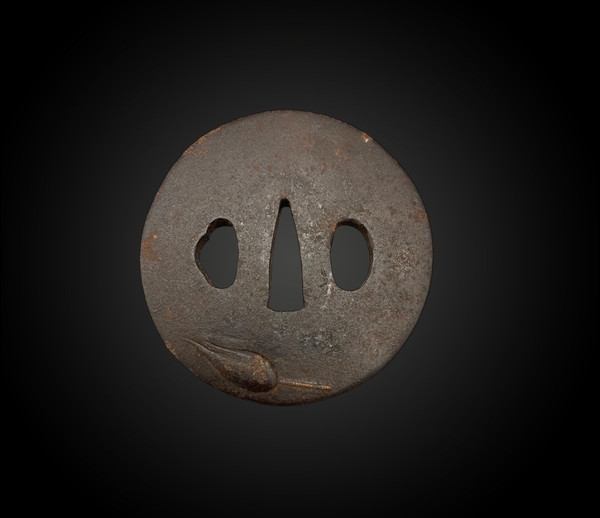 TSUBA in iron, maru gata, with chiseled decoration; signed - JAPAN - Edo period - 18th century