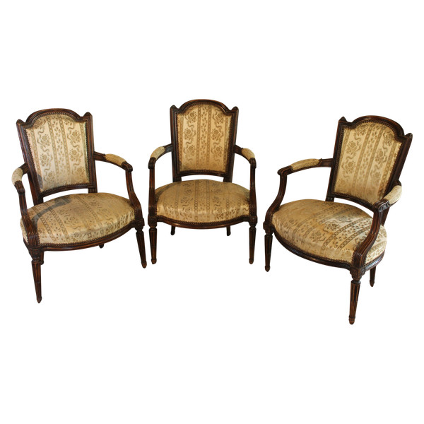 3 Louis XVI armchairs in carved and molded beech, late 18th century