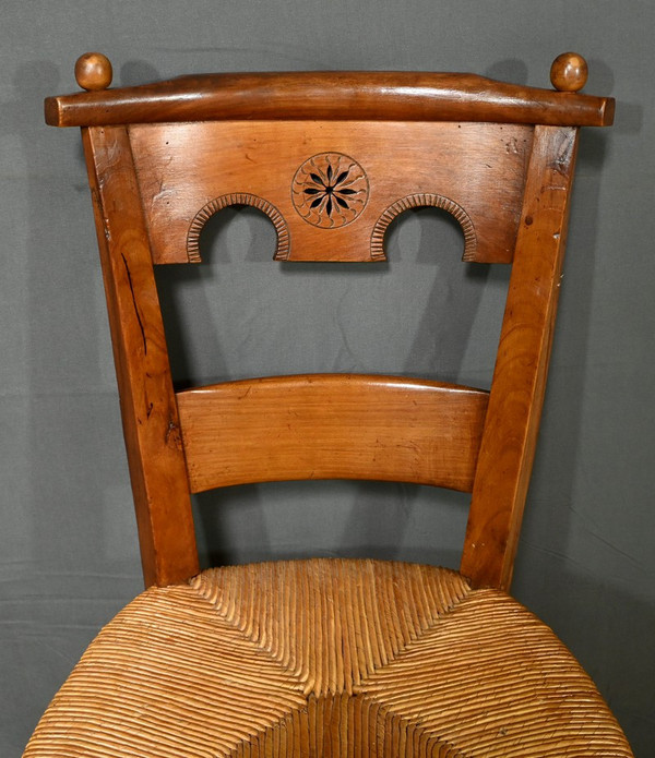 Suite of 4 cherrywood chairs, Directoire period - Early 19th century