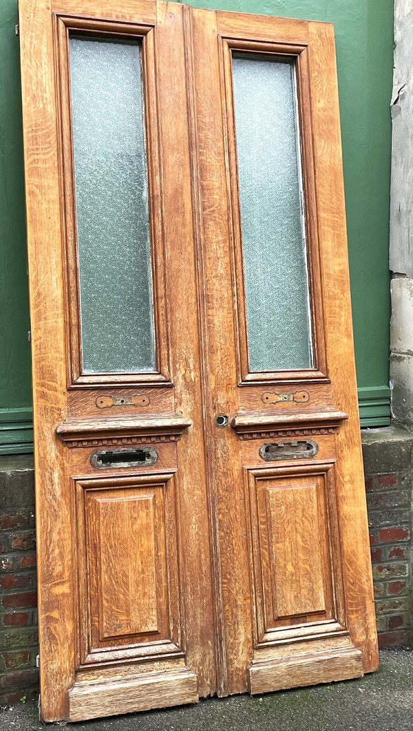 Paire de portes d’entrée en chêne provenant d’une maison bourgeoise