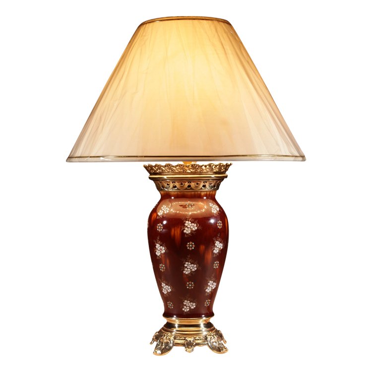  A French table lamp in ceramic and brass.