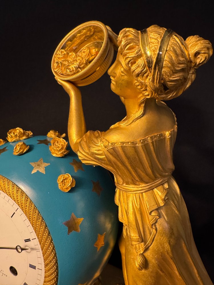 Empire "Flora fertilizing the universe" clock with roses