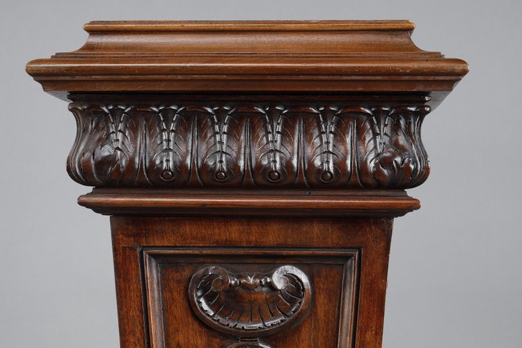 PAIR OF CARVED MOLDED WALNUT SELLETTES WITH FRUIT AND PLANT DECORATIONS