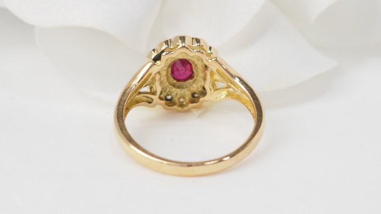 Yellow gold, ruby and diamond daisy ring